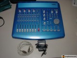 Blue Mixer with Electronic Equipment