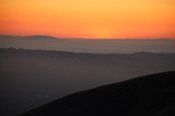 Layered Dusk Silhouettes Over California's Hazy Valleys