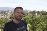 Man with a Beard Strikes a Pose in Nature