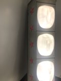 Illuminated Television in Cupboard