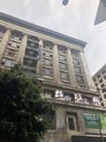 City High-Rise with Eye-Catching Sign