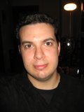 Smiling Man in Black Shirt
