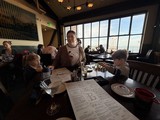 Family Dining Together at Waterfront Restaurant