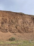 Majestic Cliff with Earthy Terrain