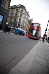 Modern Red Double-Decker Bus on London Street