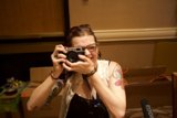 Tattooed Photographer Captures the Moment