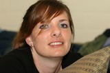 Candid Portrait of a Smiling Redheaded Woman