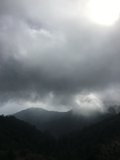 Majestic Mountains and Cumulus Clouds