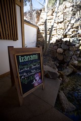 Izanami Restaurant Week Sign in Artistic Stone Courtyard