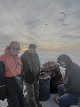 Commercial Fishing Crew at Dawn