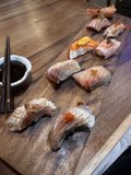 Savoring Sushi on a Beautiful Wooden Board