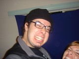 Laughing Friends Making Exaggerated Faces at Party