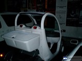 A Car Hauling a Mystery Box