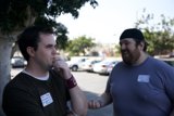 Two Men and Four Cars
