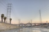River, Power Lines, and Palms