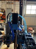 Manufacturing Machine with Hose Attachment