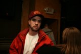 Red Jacket and Baseball Cap at the Pub