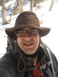 The Stylish Man with a Sun Hat