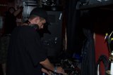 DJ S: Grooving with Headphones and a Cap