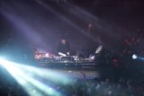 DJ ignites the audience with music and light