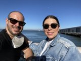 Smiling Couple Captures the Perfect Selfie by the Water