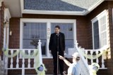 A Dapper Groom on the Porch