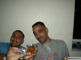 Two Men Toasting with a Glass of Lager