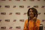 Woman Shows Peace Sign at Politicon 2015