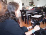 Woman and Dog at the Dining Table
