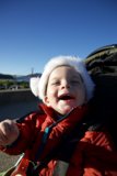 Smiling in Santa's hat
