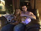 Man and Dog Cozy Up on the Couch