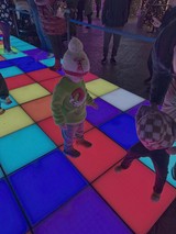 Children Playing on Interactive Light-Up Floor