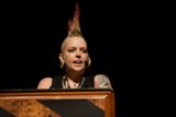 Unapologetically Tattooed: A Mohawked Speaker Captivates the Crowd