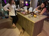 Two Women and a Pup in the Kitchen