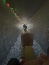 Underground Tunnel Journey with Illuminated Path
