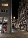 Towering Over the Cobblestone Street