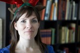 Penelope Wearing Reindeer Antlers on Christmas Day