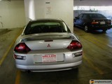 Silver Sports Car Parked Inside Garage