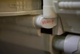 Plumbing Label on Toilet