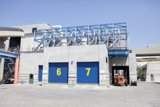 Building with Blue Doors and Yellow Number 7