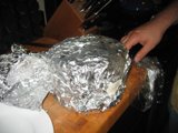 A Person Holding a Piece of Aluminium Foil
