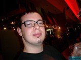 Portrait of Dave B. Enjoying a Drink at a Hip Urban Bar