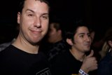 Smiling man at an urban night club