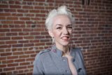 Happy Lady in Gray Jacket