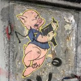 Armed Pig on the Wall