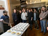 Group of People Enjoying a Delicious Meal Together