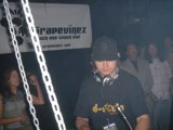 Black-shirted Deejay in a Night Club