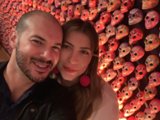 Smiling Couple with Skulls