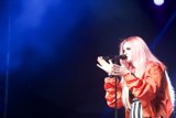 Pink-haired Singer Shines on Stage