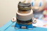 Hat-wearing Figurine